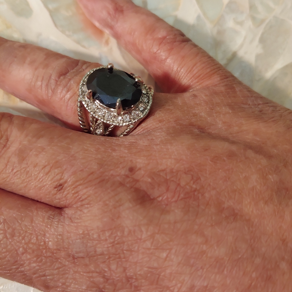 Silver ring with black stone